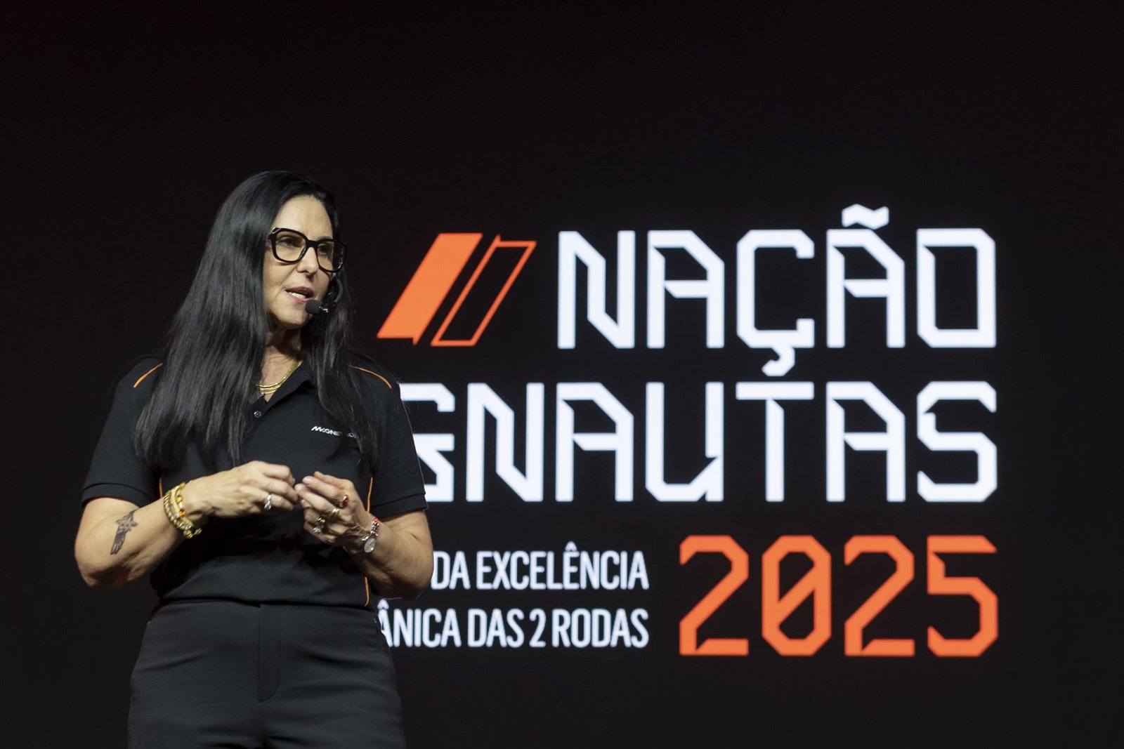 Palestrante no palco do Nação Magnautas